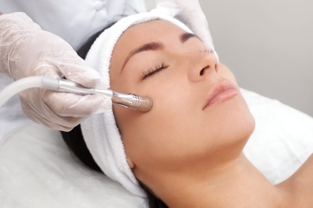 Microdermabrasion facial treatment for skin rejuvenation at Sundara Spa, complementing expert microblading McAllen TX services.
